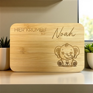 Fruehstuecksbrett Bambus Hier kruemmelt